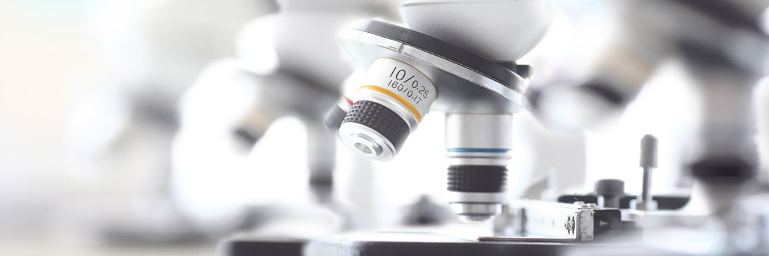 Mikroskop Nahaufnahme als Symbol für Forschung